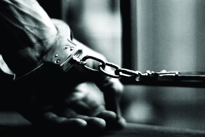 BW-Prisoner behind bars-Matteo Parrini