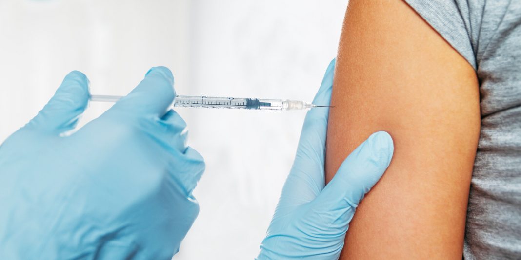 Medical vaccine in shoulder