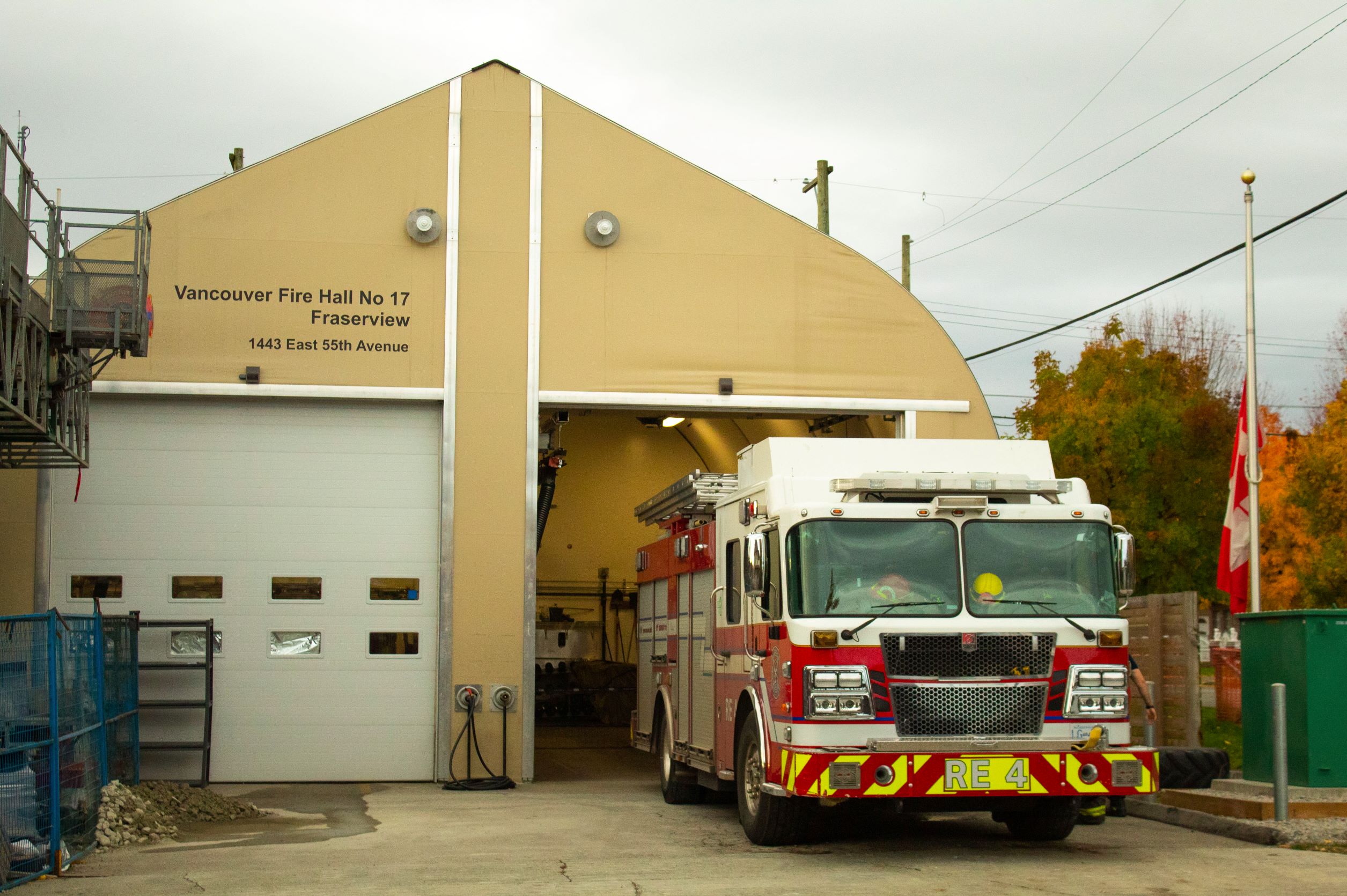 A firehall with a fire truck