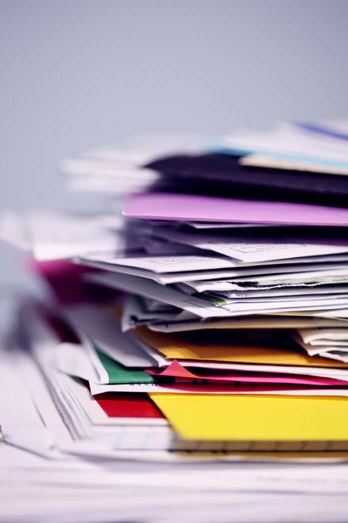 Week 6 PeakBox A stack of different coloured letters all piled on top of each other.