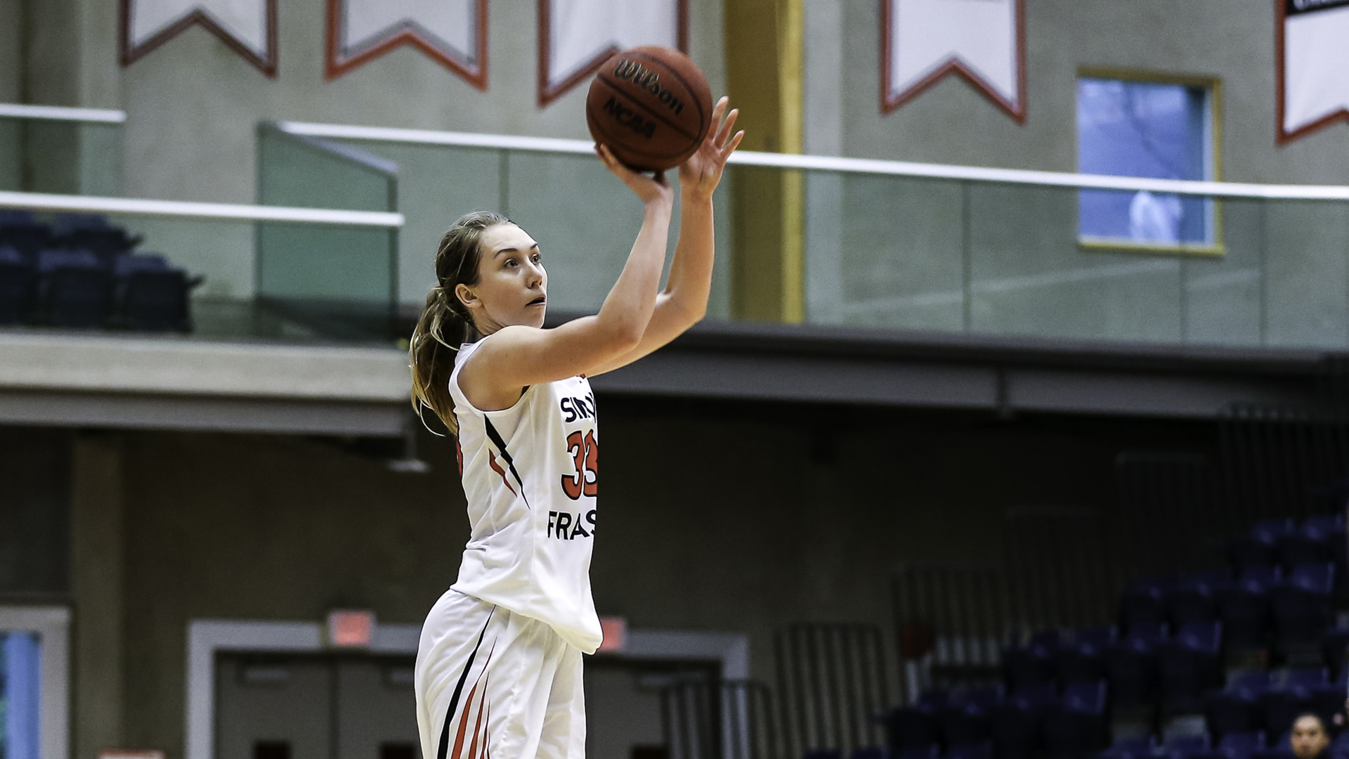 Jessica Jones snapped mid-air releasing the ball.