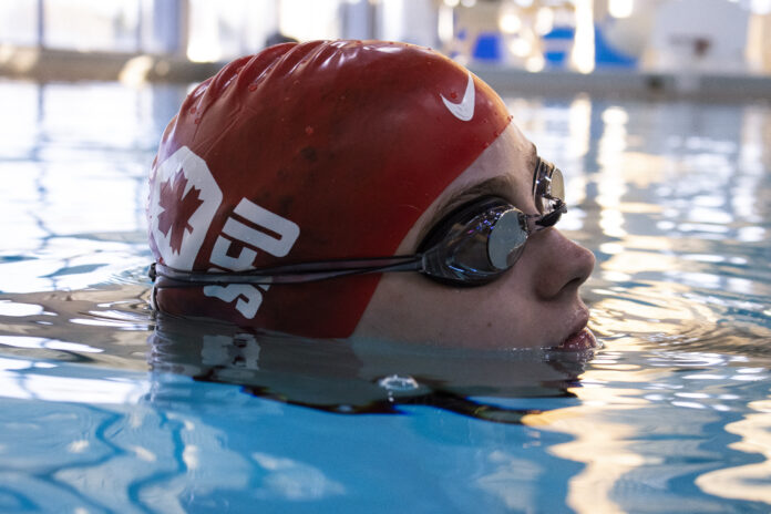 IMG_8704 Photo of Isabelle Roth with half of her head raised above the water.