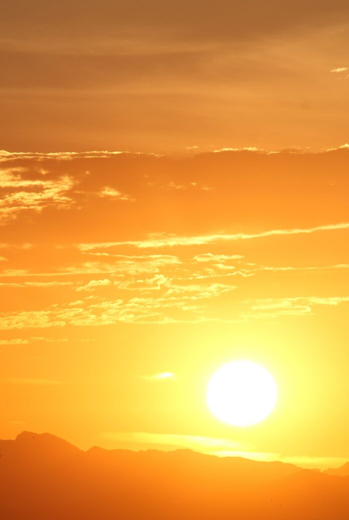 james-day-5YWf-5hyZcw-unsplash An orange sunset