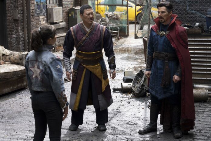 Doctor-strange-in-the-multiverse-of-madness Dr. Strange (Benedict Cumberbatch), Wong (Benedict Wong), and America Chavez (Xochitl Gomez) in Doctor Strange in the Multiverse of Madness.