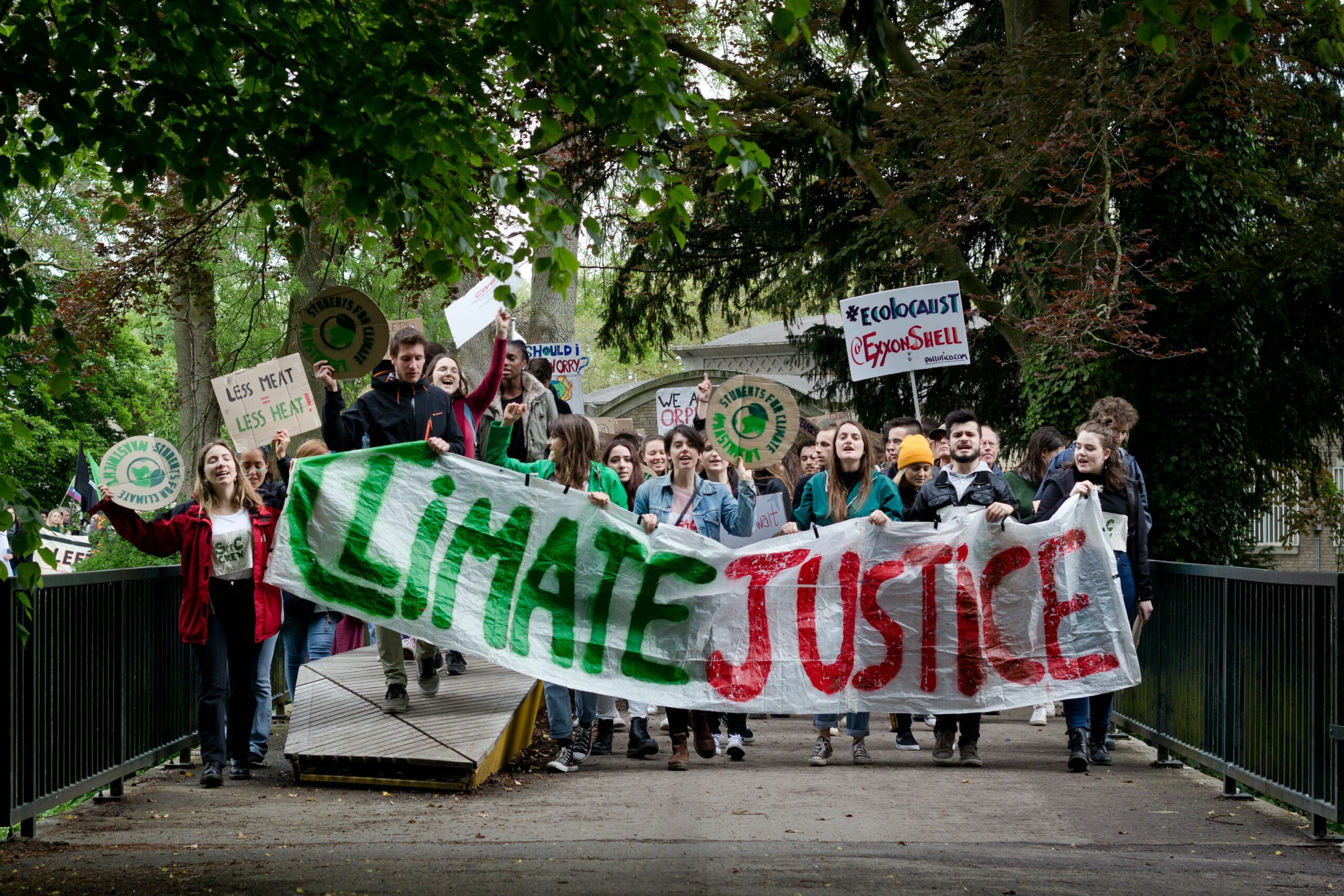 A banner reading “climate justice” at a youth climate rally