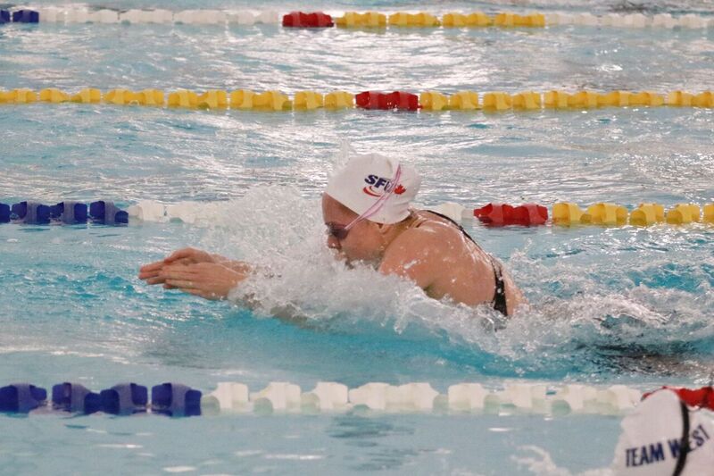 photo of Jordan Doner mid-competition in the water.