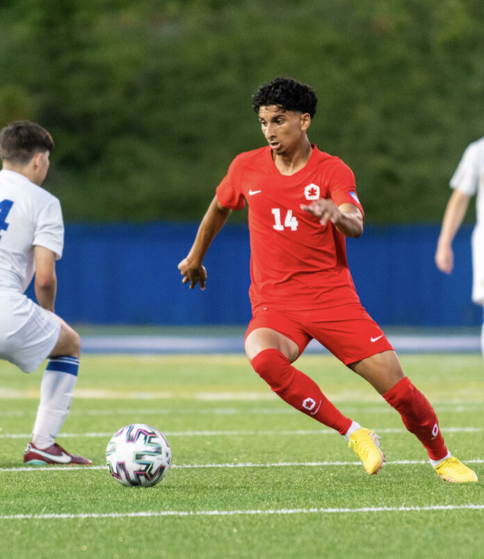 Royce photo of Royce Dhillon playing on the field.