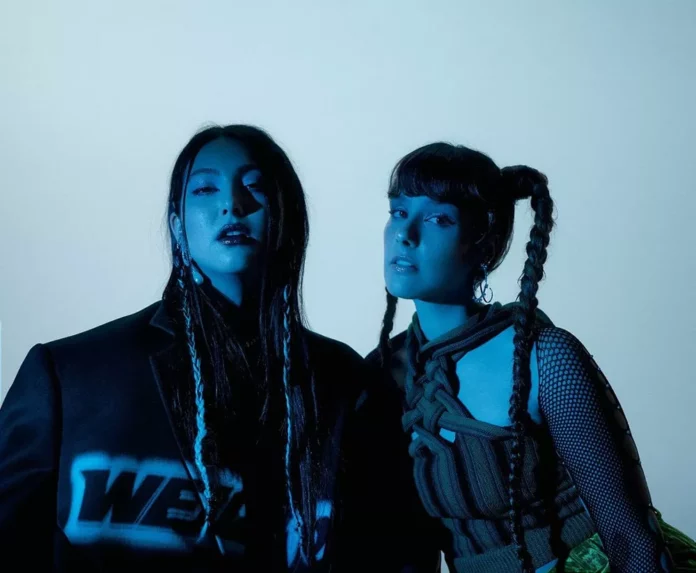 Laurence Lafond-Beaulne and Camille Poliquin (Milk & Bone) in blue lighting