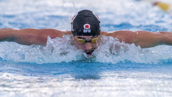 photo of an SFU swimmer from their competition against UBC.