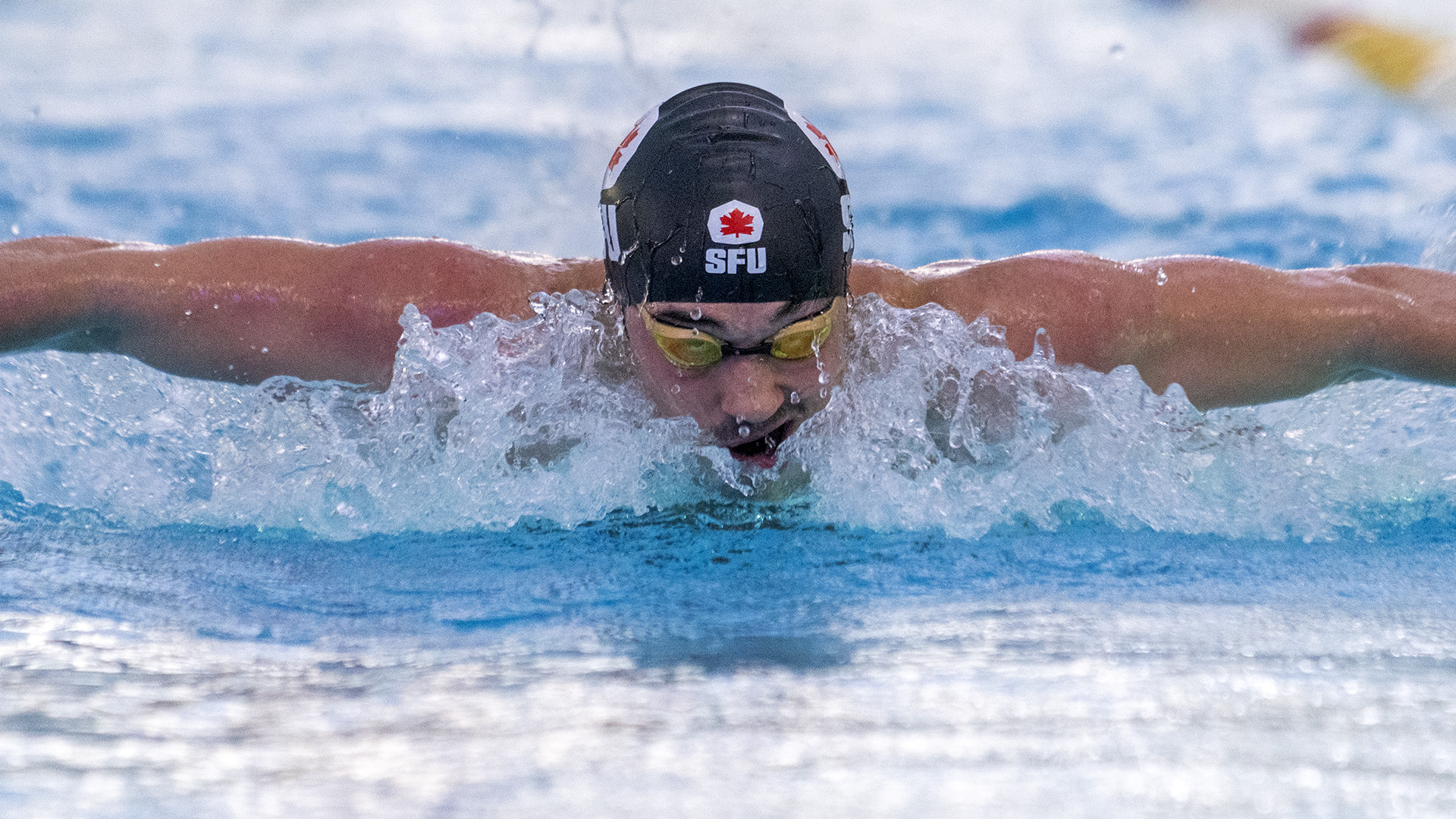 photo of an SFU swimmer from their competition against UBC.