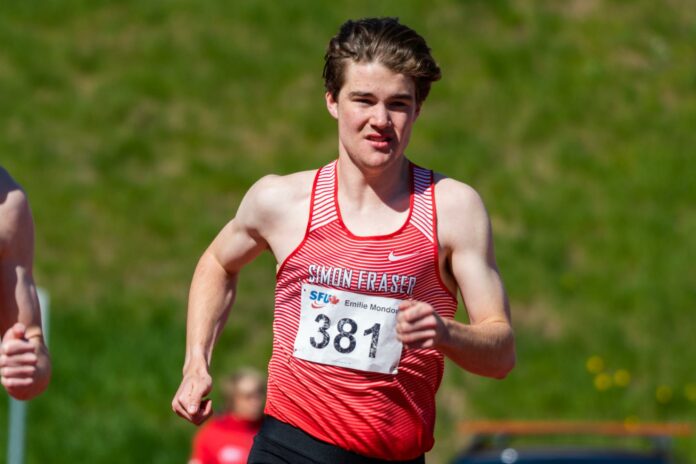 2022_04_09_TF_emilie_mondor_by_wilson_wong_1067 photo of SFU runner Aiden Good mid-race.