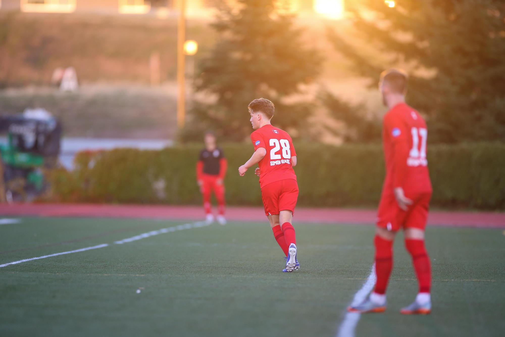Photo of SFU defender Aaron Colbourne mid-game.