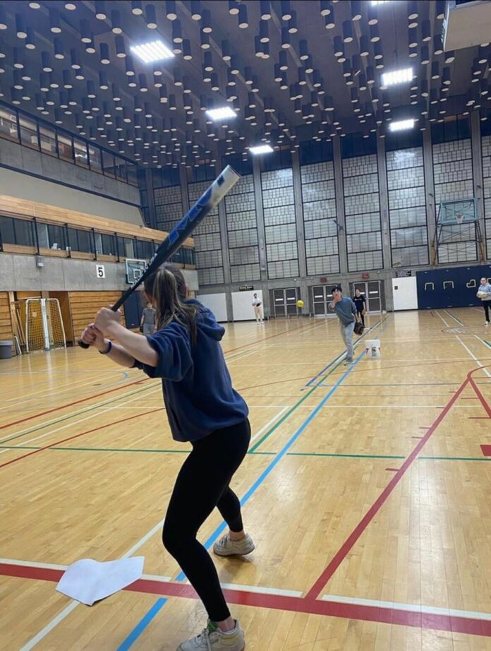 IMG_7273 photo of an SFU softball member squaring up for a pitch.