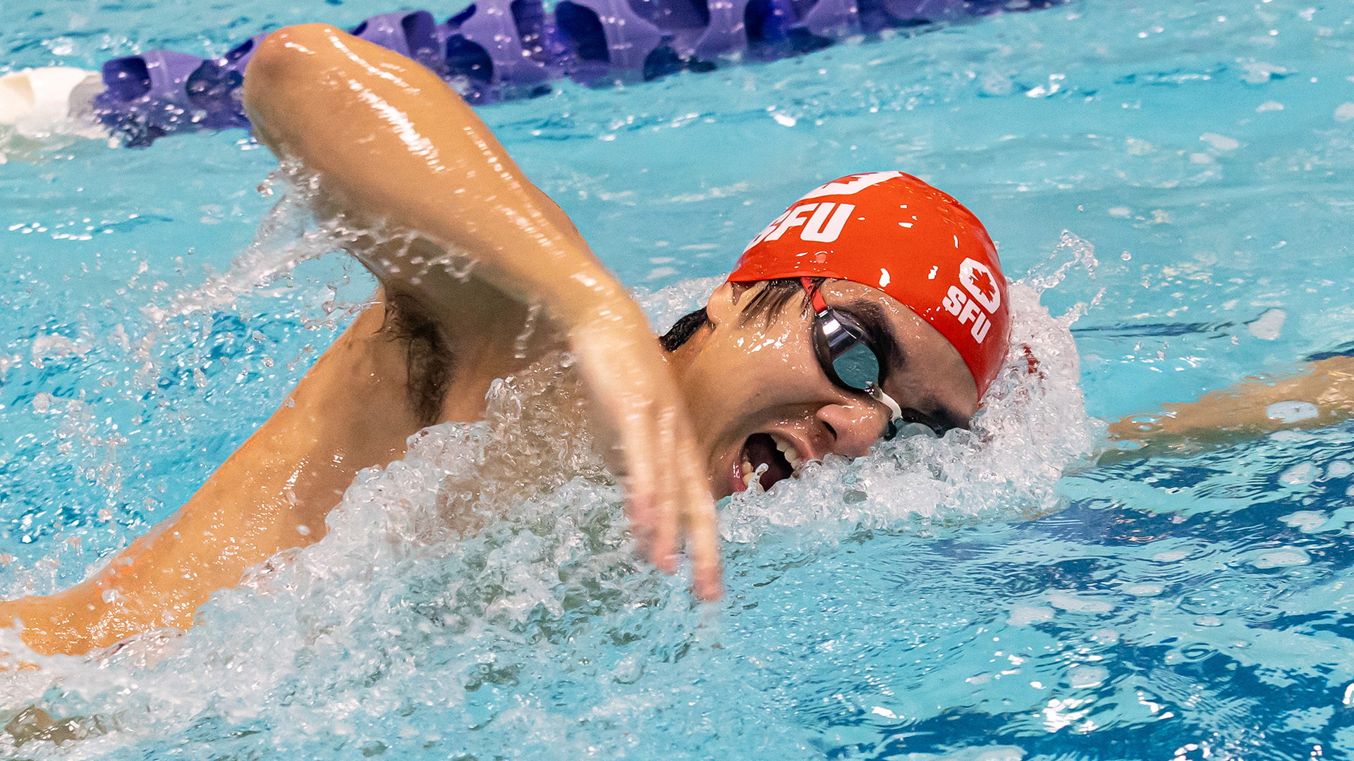 Photo of Marcus Mak in the pool during competition.