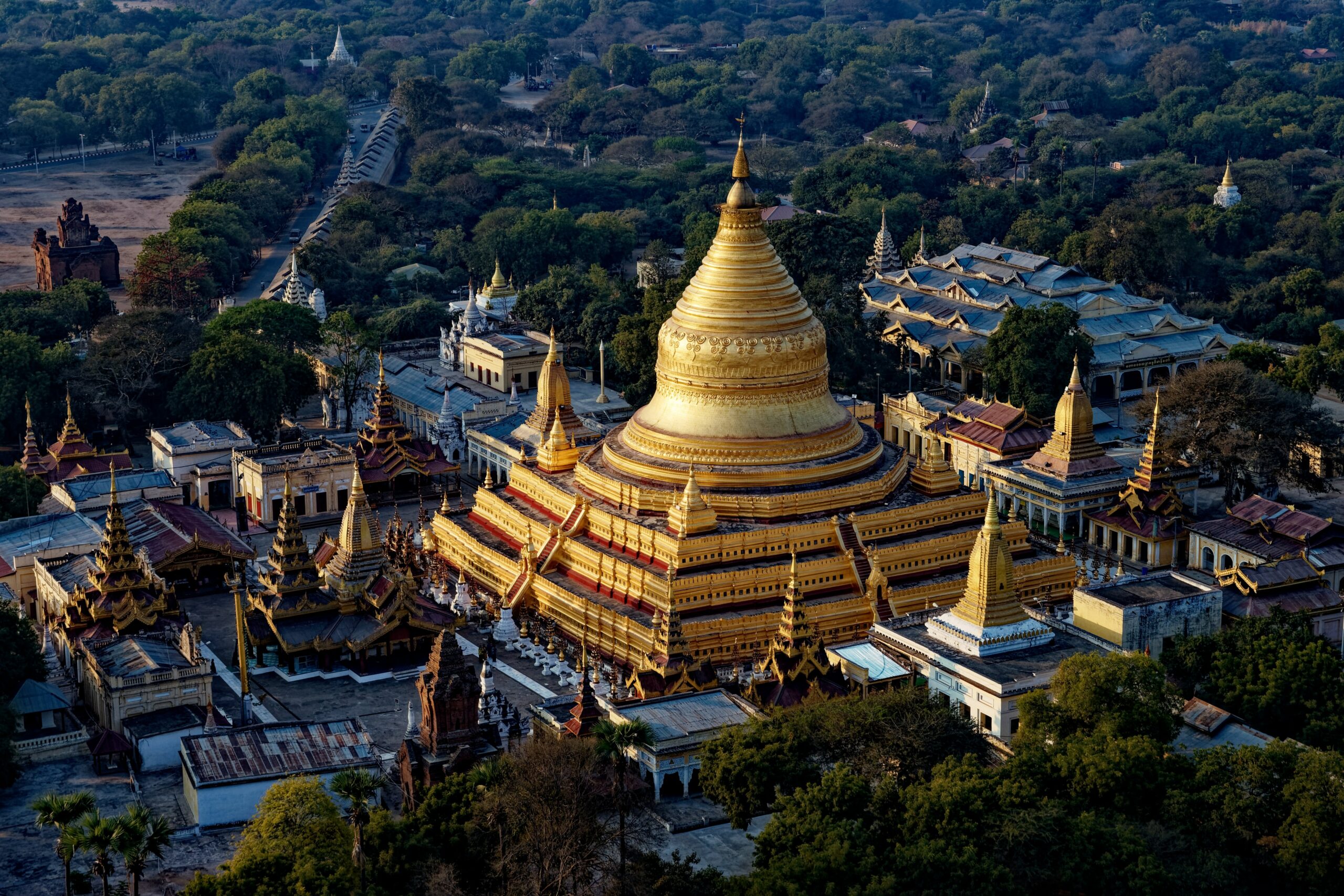 This is an aerial photograph of a temple in Myanmar. The roof is solid gold.