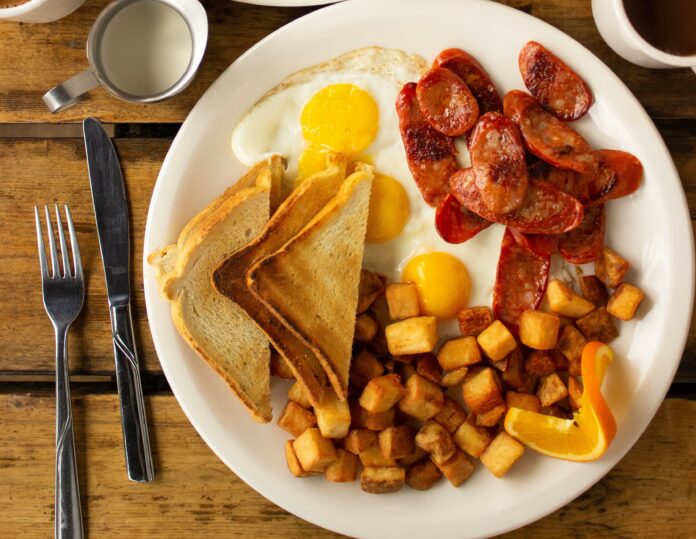 Table of eggs, sausage, and hashbrowns