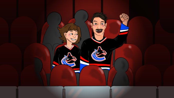 WEB-HaileyGil-Lettertoalegendhockey.png photo of a father and daughter watching a hockey game live together.