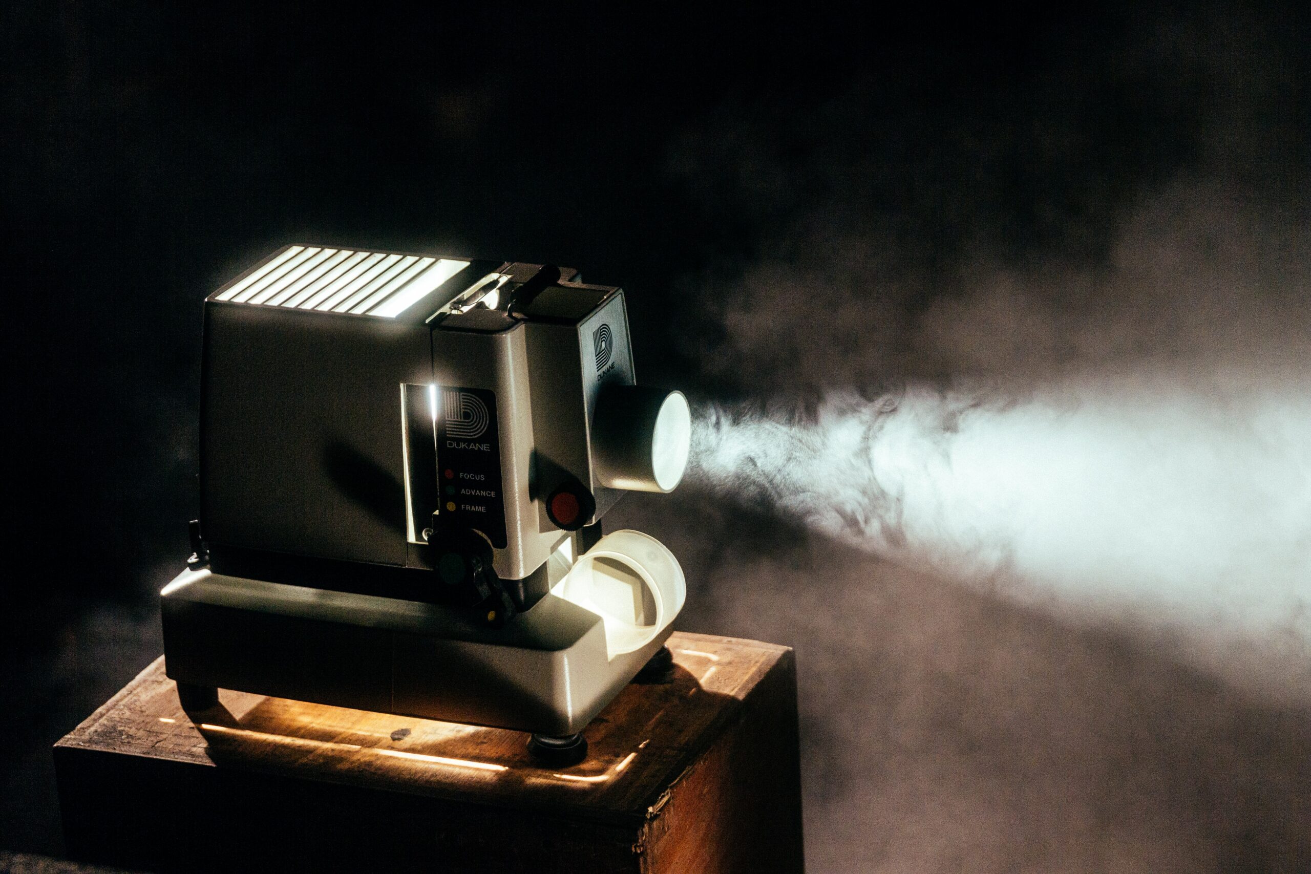 dimly lit shot of a large movie camera