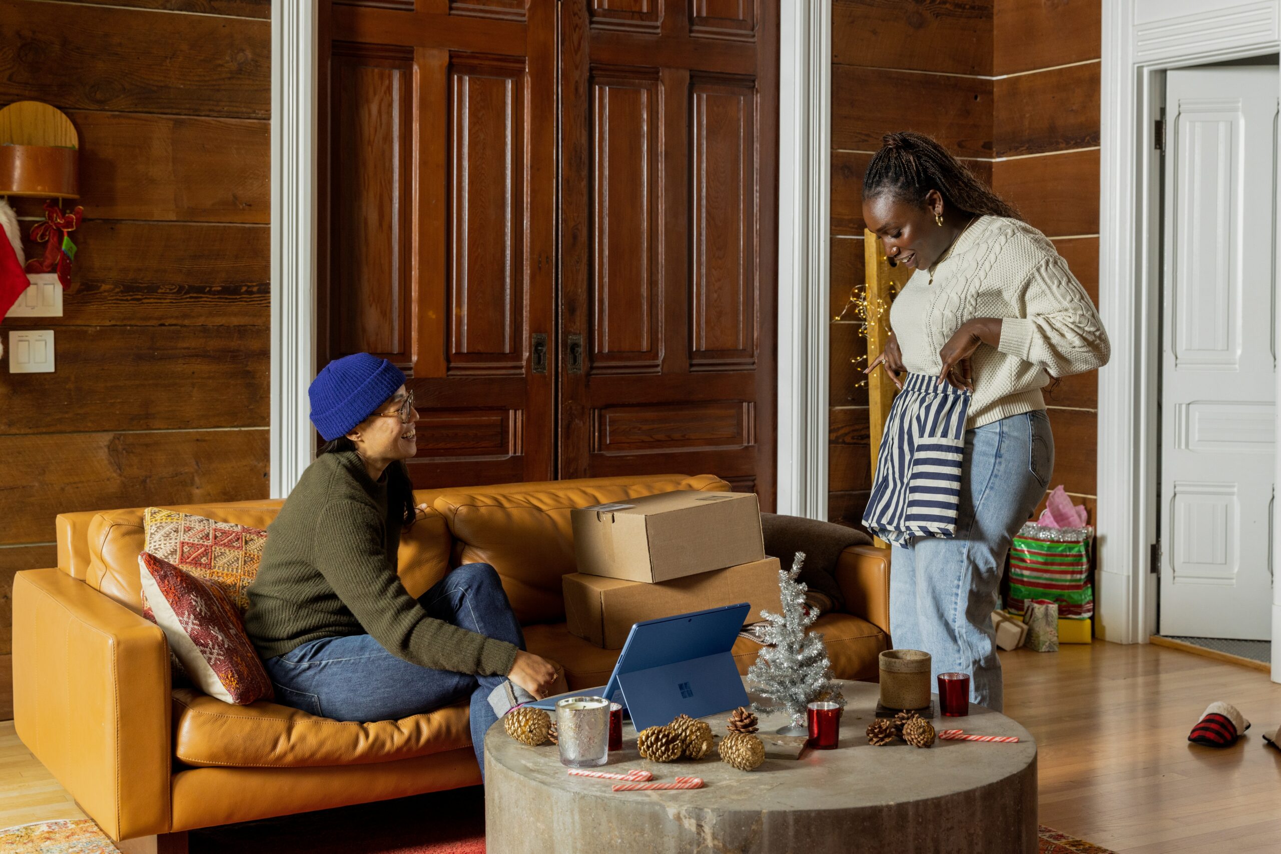 A group of people sitting around a living room