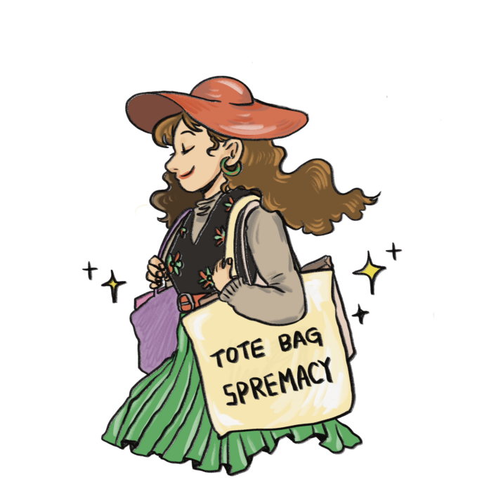 Super fashionable person wearing a bunch of designer items and a tote bag that has “Tote bag supremacy” written on it.