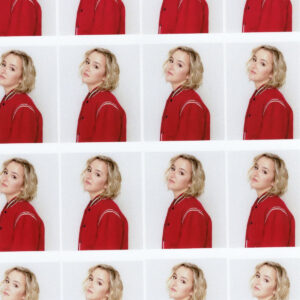 The album cover of Blame My ex by The Beaches is divided into multiple squares of the same image: one of the band members with a platinum blonde bob and red varsity jacket half-smiling.