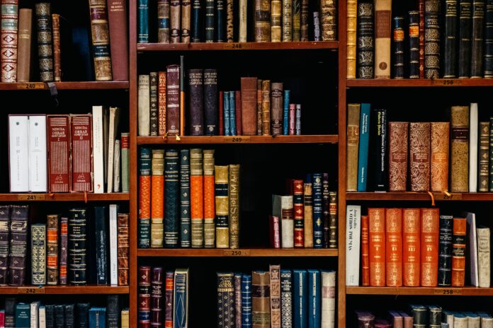 A bookshelf filled with academic books