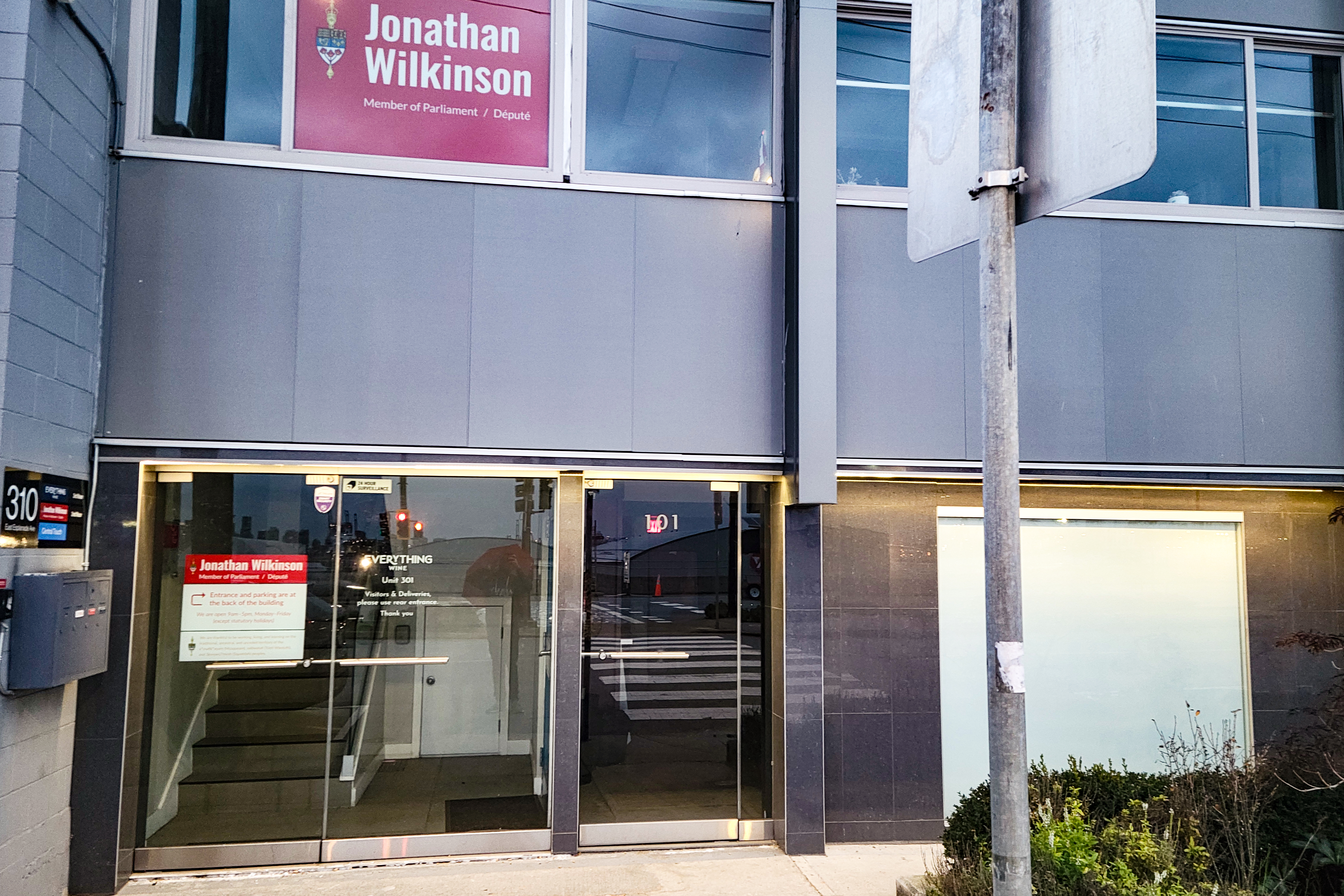 This is a photo of the outside of the minister of energy and natural resources office. His name, Jonathan Wilkinson, is written on the outside of the building