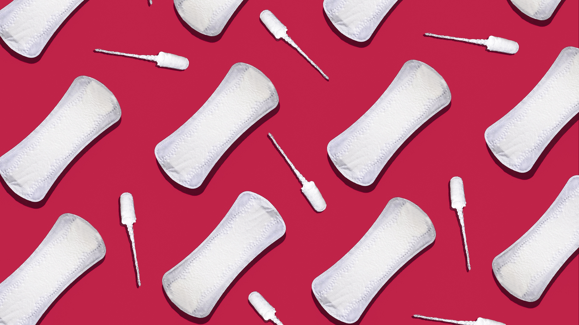 This is a photo of pads and tampons on a pink background. The pads and tampons are laid out in a repeating pattern.