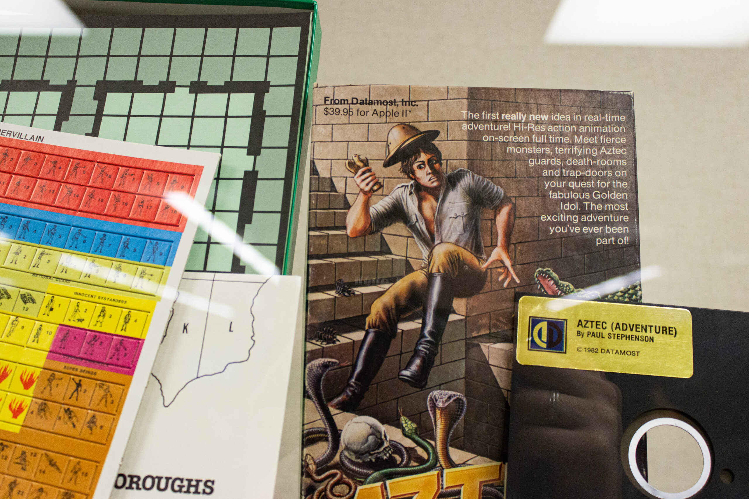 This is a photo inside the SFU archives. Most prominent in the photo is an antique video game cover.