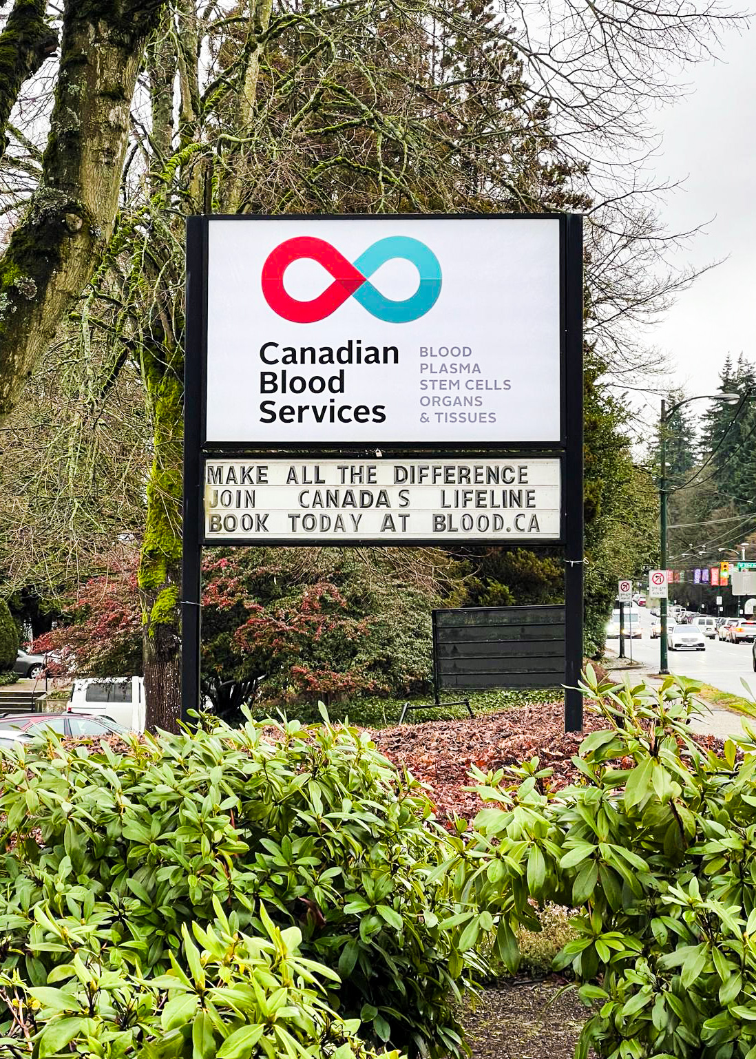 This is a photo of the Canadian Blood Services Sign at their location on Oak Street Vancouver. The sign includes the company’s logo, and the message, “Make All the Difference, Join Canada’s Lifeline, Book today at Blood.ca.”
