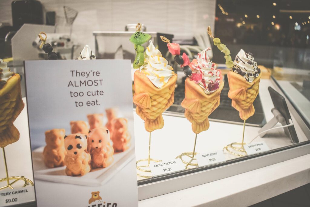 A row of cro-tai croissants, which are shaped like fish and filled with cream