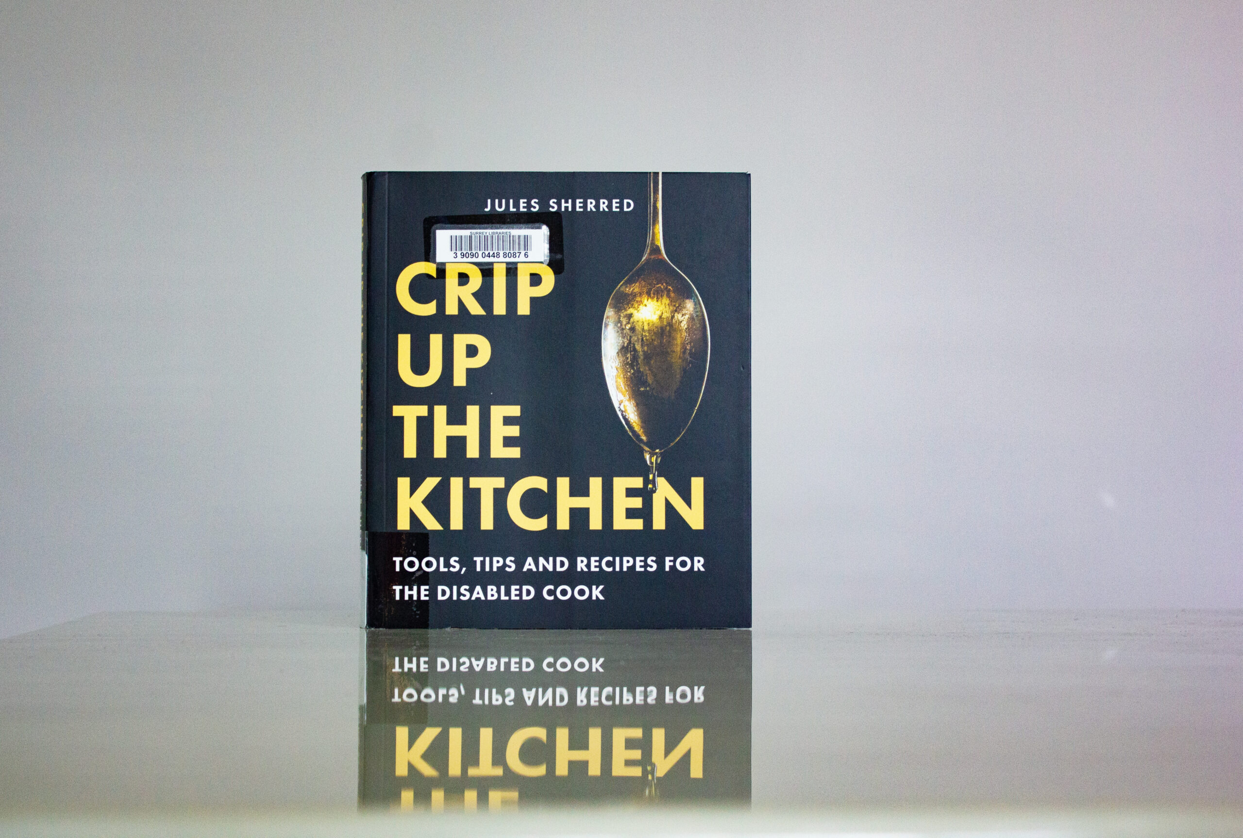 A photo of the hardcover book with the title “Crip Up the Kitchen.”