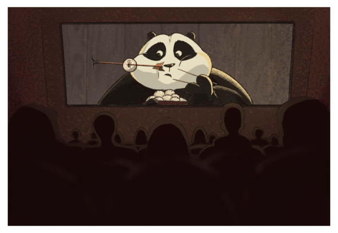 silhouette of people watching Kung Fu Panda on a movie theatre screen