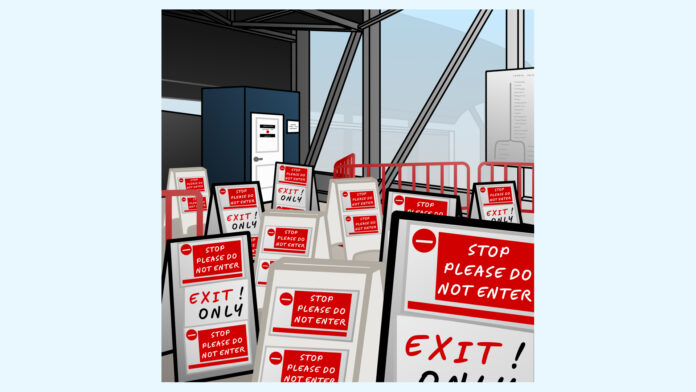 Web Skytrain Entrance to access the SkyTrain blocked by ten “STOP, DO NOT ENTER” signs.