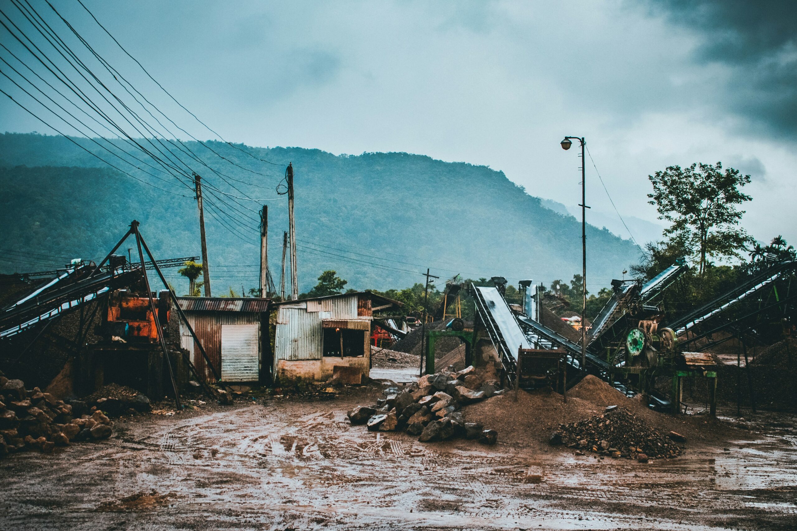 A town with buildings and roads destroyed by flooding.