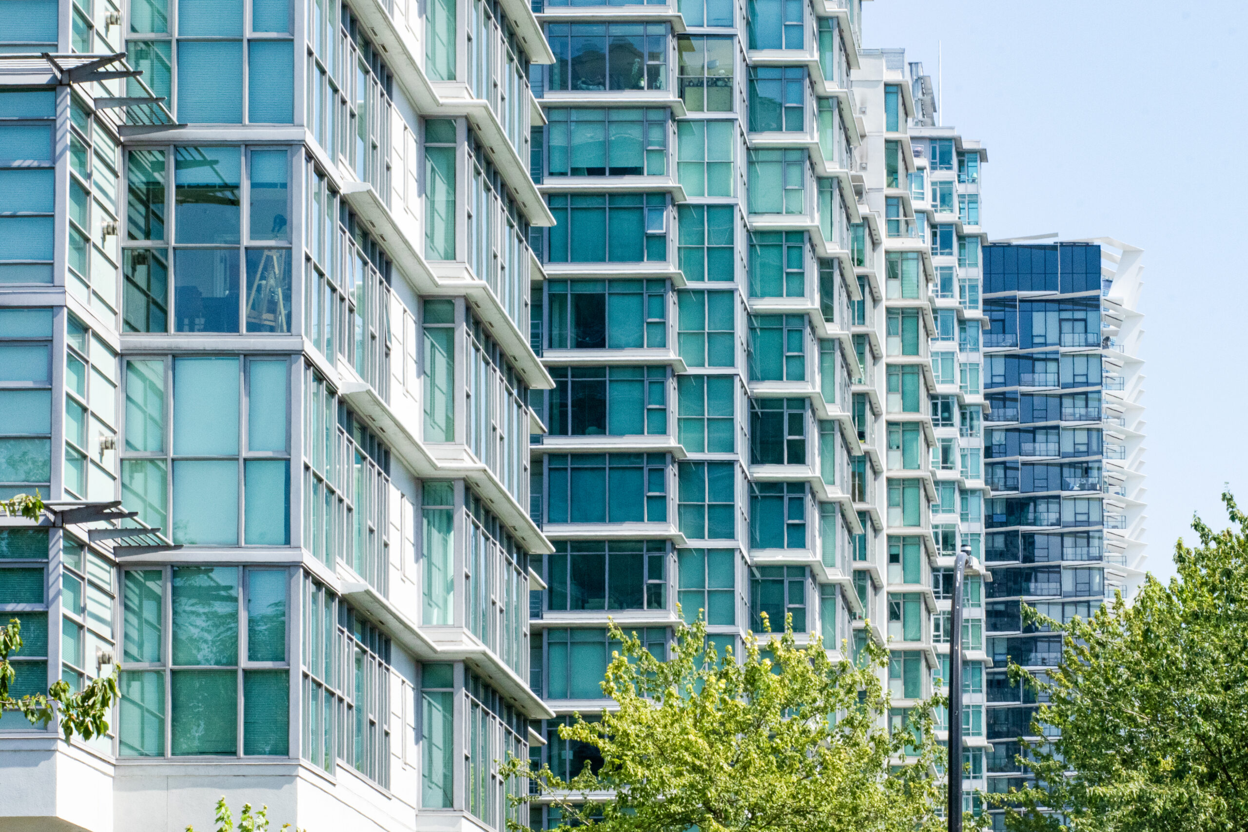 This is a photo of a row of high-rise apartment buildings