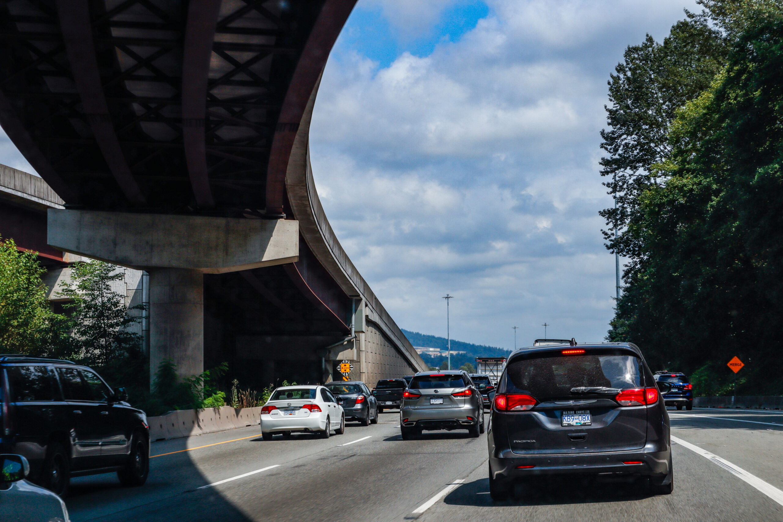 Cars driving on a highway.