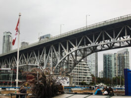 This is a photo of the Granville Bridge taken from the Granville Island public market