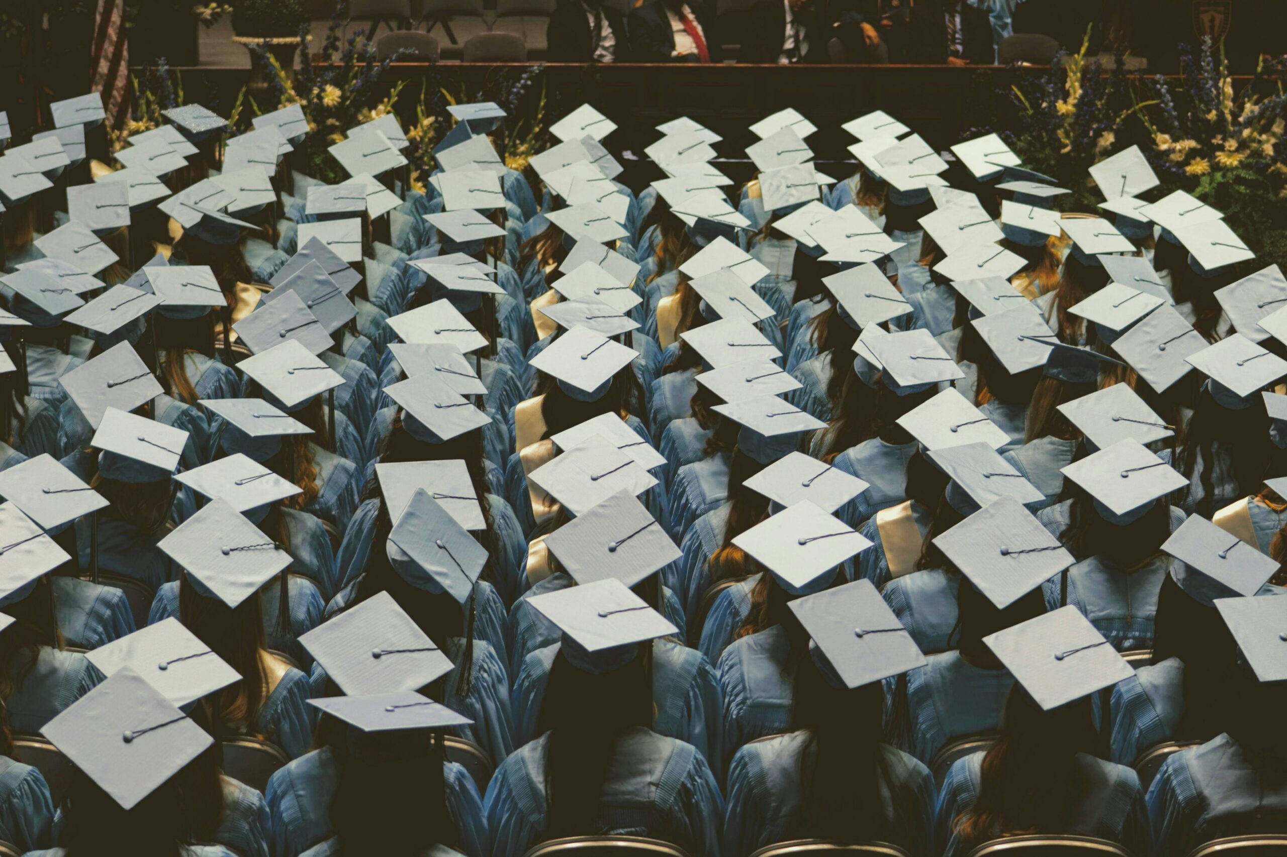 A group of people wearing graduation caps