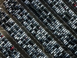 A full parking lot as seen from above