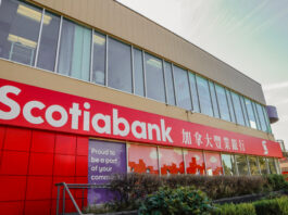 This is a photo of a Scotiabank building with the word “Scotiabank” also written in Chinese on the building.