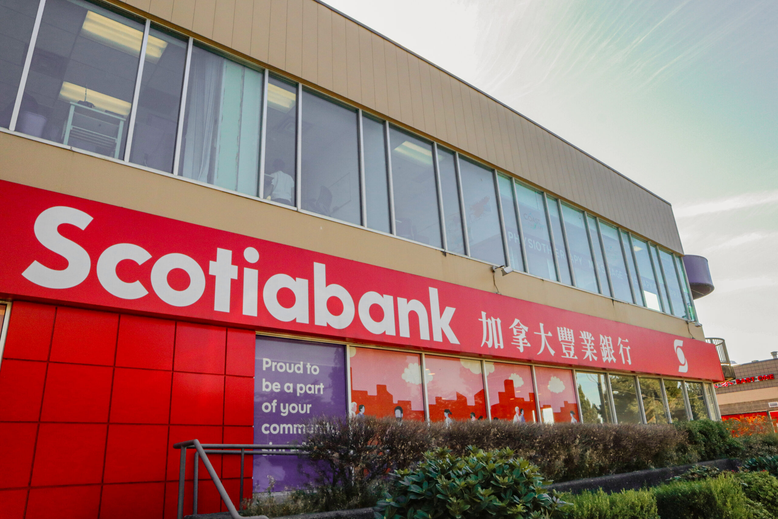 This is a photo of a Scotiabank building with the word “Scotiabank” also written in Chinese on the building.