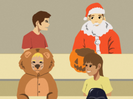 Six students sitting in a lecture hall. Three are wearing Halloween costumes. One is dressed as Darth Vader, one is dressed as Santa Claus, and the other is dressed as a lion.