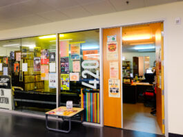 A photo of the CJSF station. Multiple posters and decorations are visible.