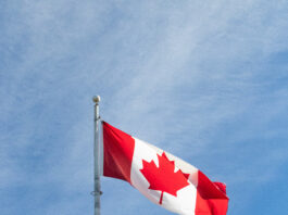 A large Canada flag on a flagpole