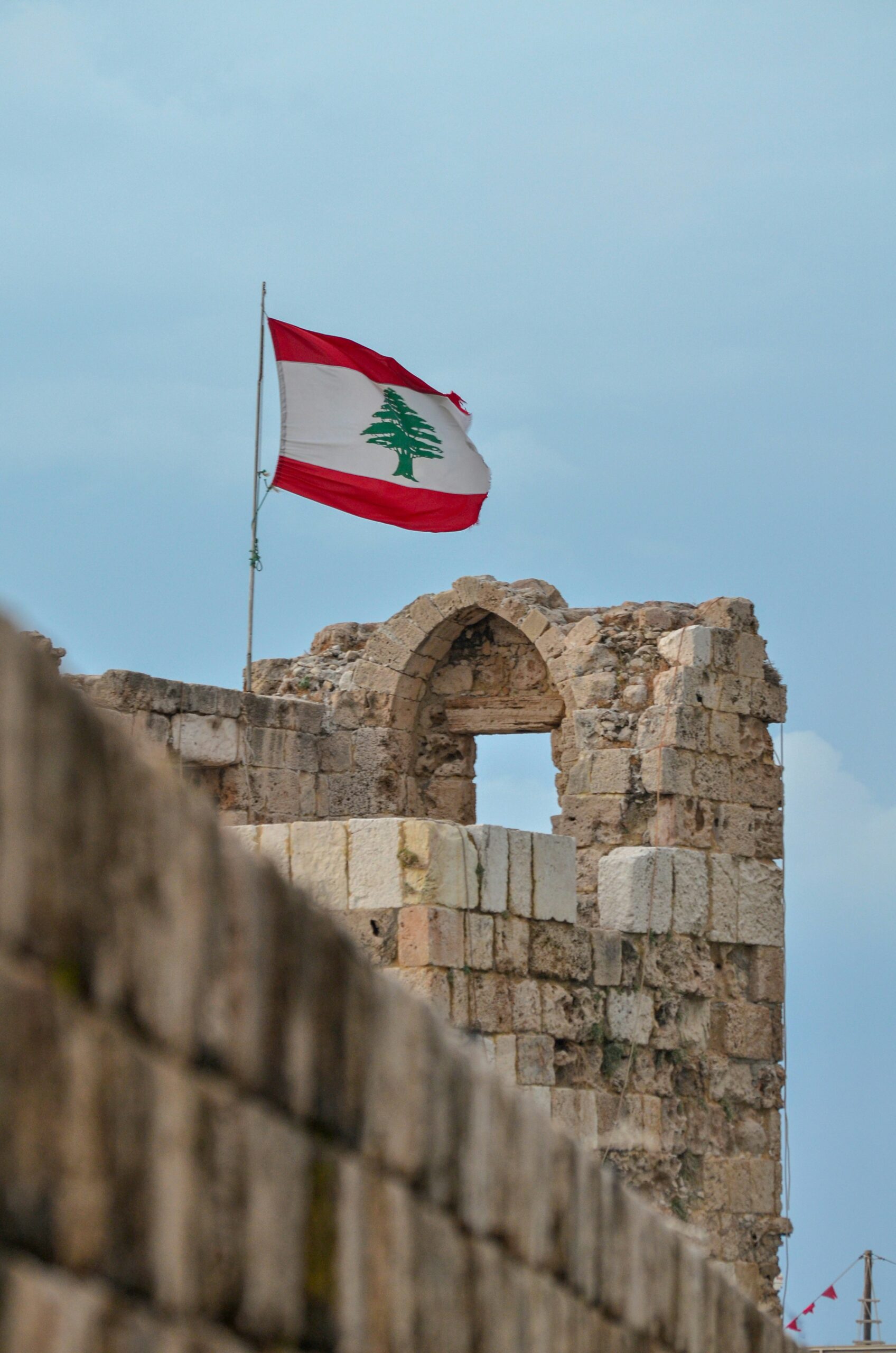 This is a photo of a Lebanon flag in the distance.