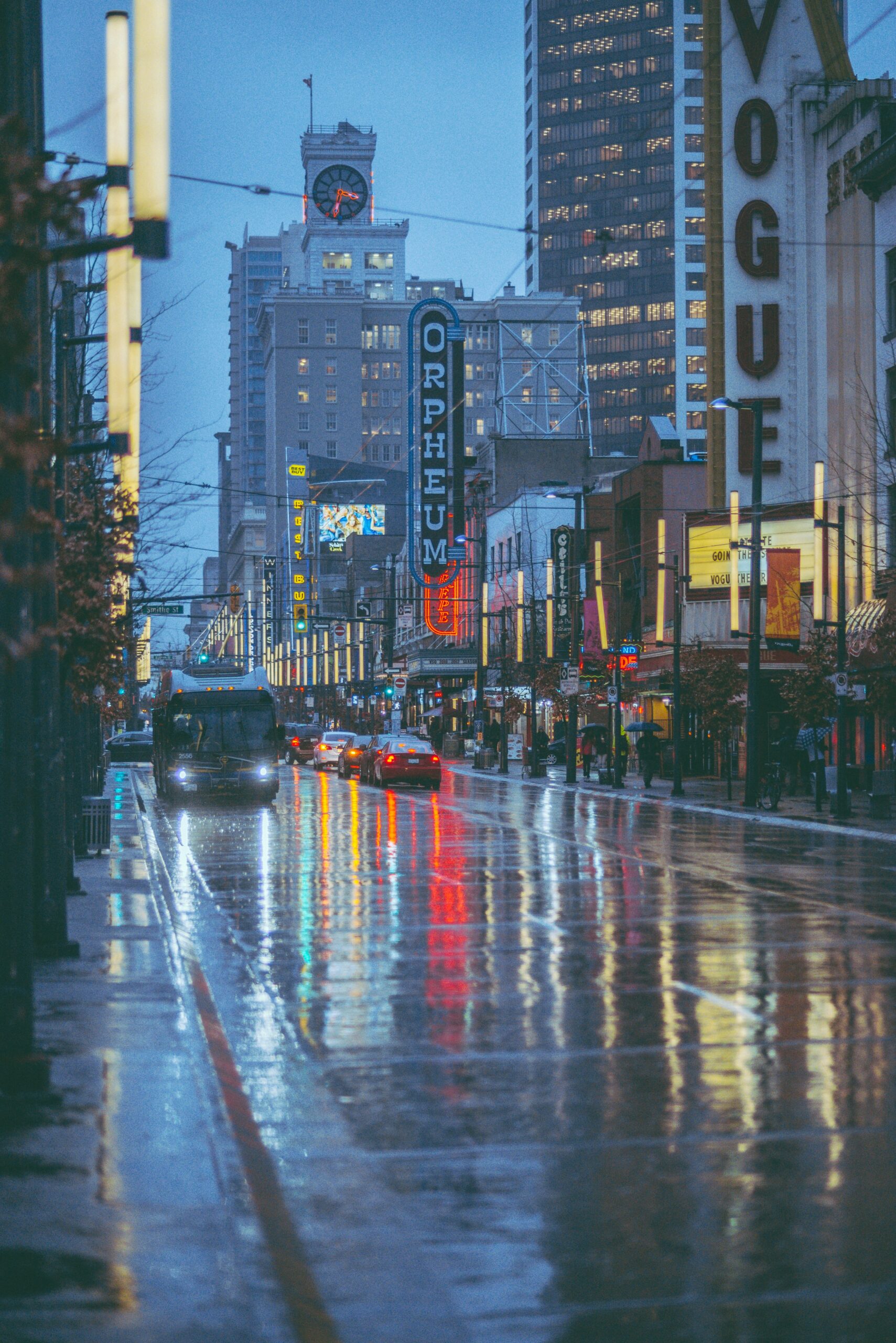 A TransLink bus driving down Vancouver’s Granville strip in the rain