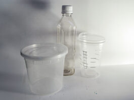 Plastic containers and bottles on a desk