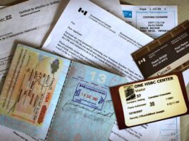 A photo of multiple forms and letters related to Canadian immigration