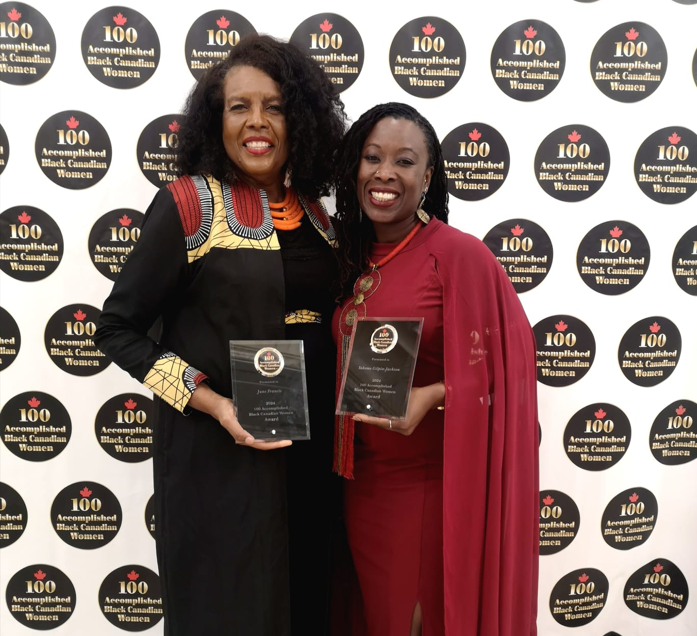 This is a photo of Dr. June Francis and Dr. Yabome Gilpin-Jackson holding their ABC Awards.